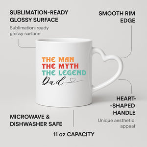 The Man the Myth Dad heart-handle mug on a marble counter with fruit