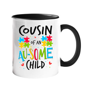 Colour handle mug with “Cousin of an AU-SOME child” with colourful puzzle pieces – black handle and inside