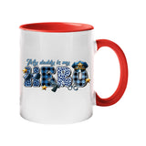 Colour handle mug with “My daddy is my hero” in blue plaid and leopard letters with a police cap and badge – red handle and inside