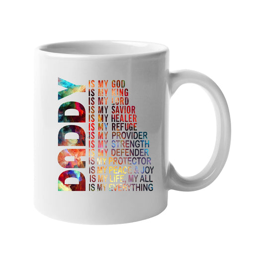 White mug with a colourful vertical “DADDY” beside “is my God, my King, my Lord… is my everything”
