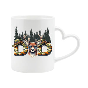 White heart-handle mug with camo “DAD” letters with a stag’s head and pine forest