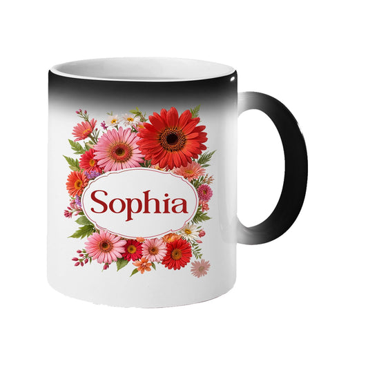 Colour changing mug revealing a red gerbera wreath around an example name