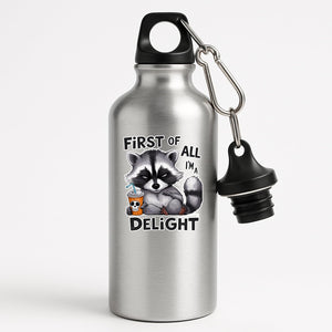 Silver aluminium water bottle with a grumpy raccoon with a skull cup and “First of all, I’m a delight”