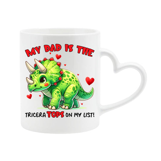 White heart-handle mug with a green triceratops with hearts and “My dad is the TriceraTOPS on my list!”