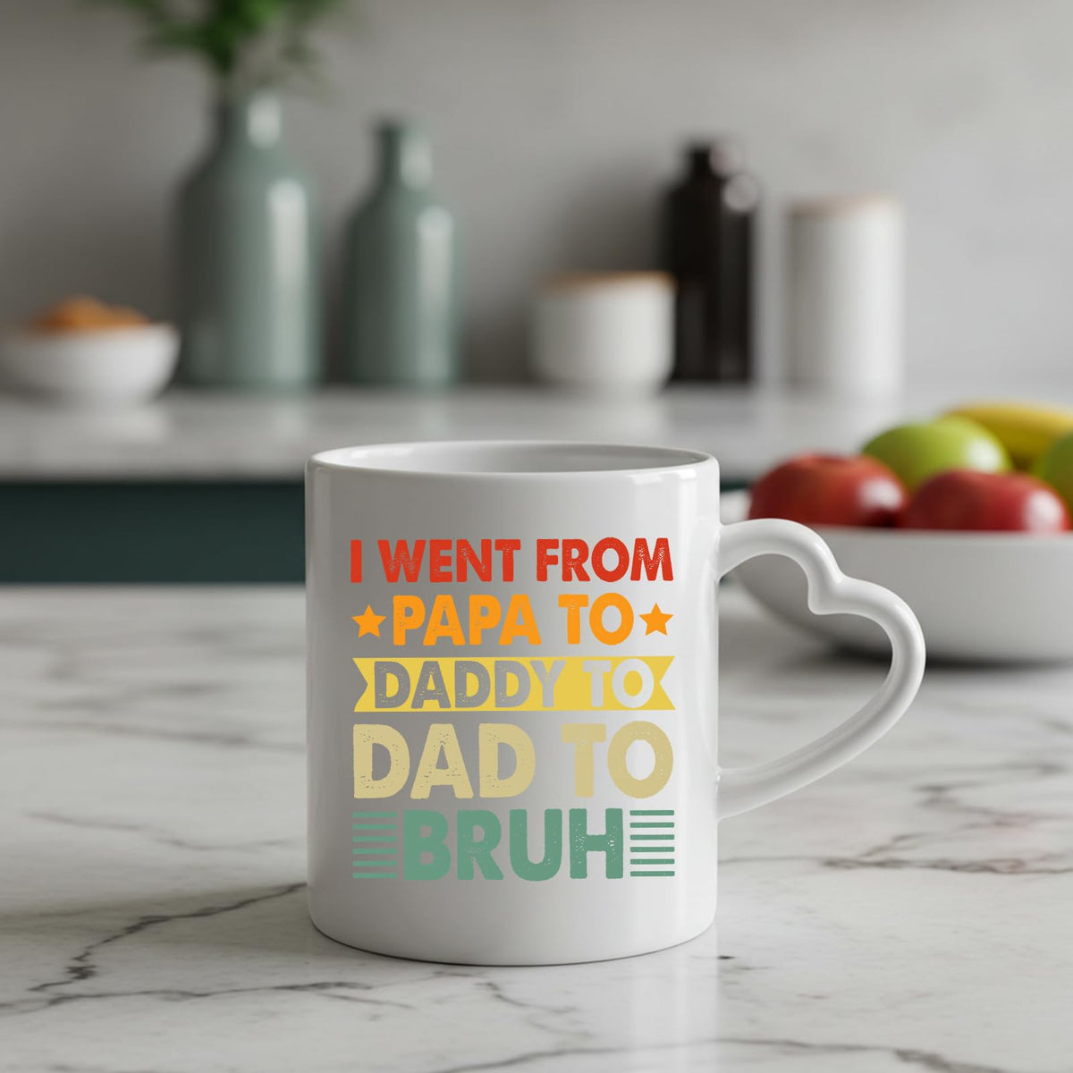 Papa to Bruh heart-handle mug on a marble counter with fruit