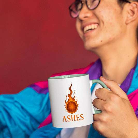 Smiling man holding the Ashes colour handle mug
