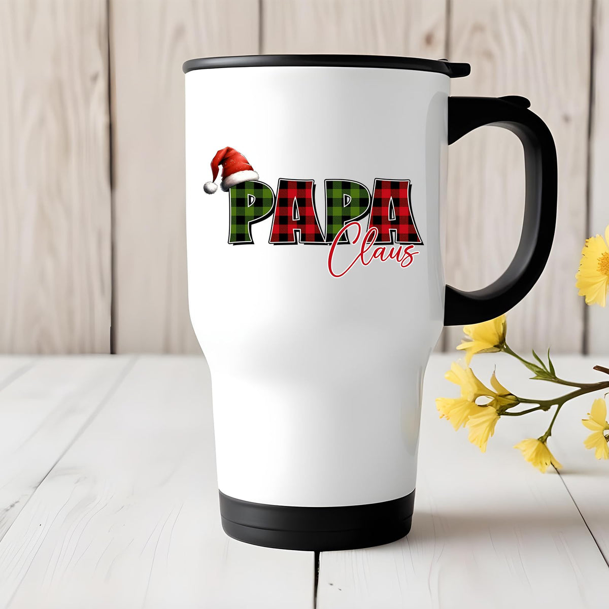 Papa Claus travel mug on a white wooden table with yellow flowers