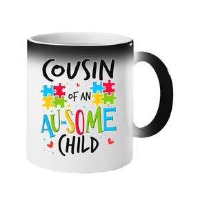 Colour changing mug revealing “Cousin of an AU-SOME child” with colourful puzzle pieces