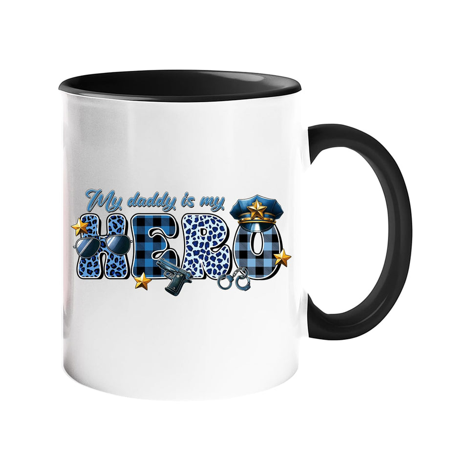 Colour handle mug with “My daddy is my hero” in blue plaid and leopard letters with a police cap and badge – black handle and inside