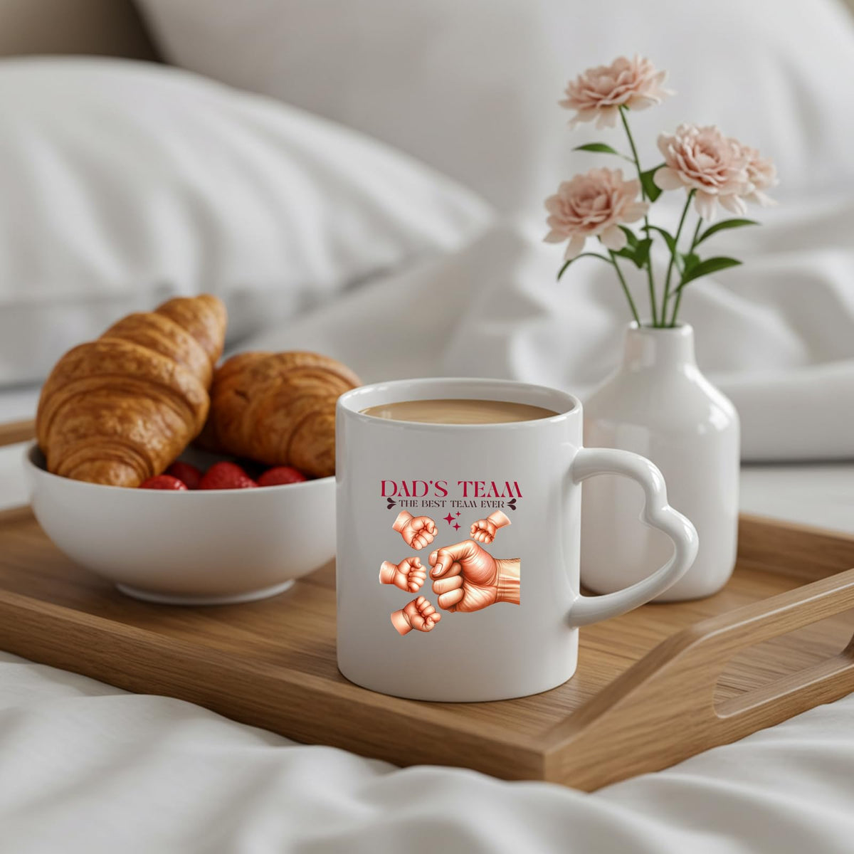 Dad’s Team fist bump heart-handle mug on a breakfast tray with croissants and flowers