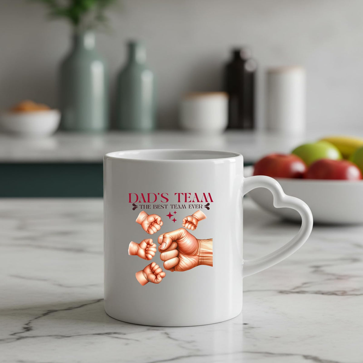 Dad’s Team fist bump heart-handle mug on a marble counter with fruit
