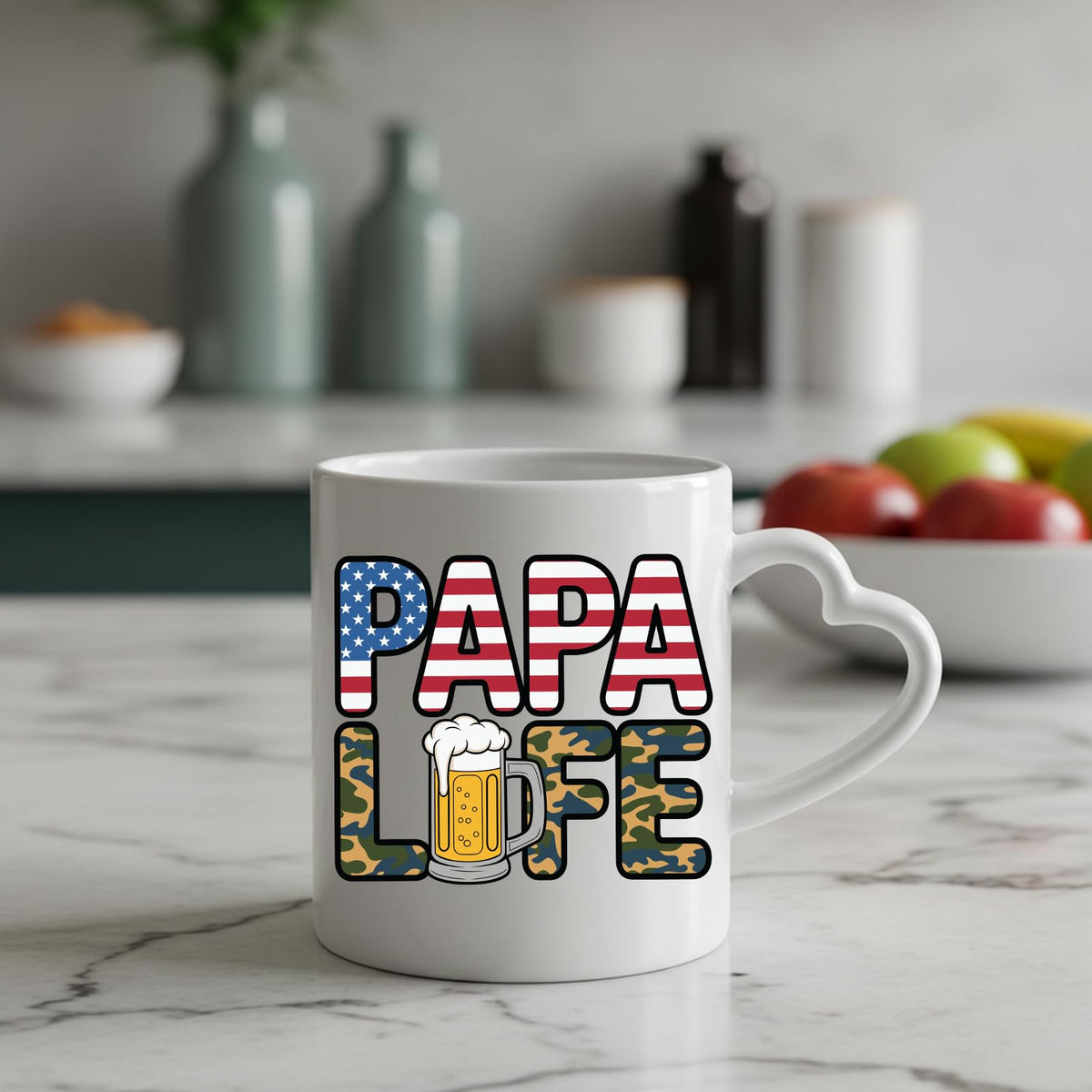 Papa Life heart-handle mug on a marble counter with fruit