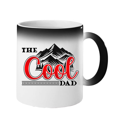 Colour changing mug revealing “The Cool Dad” in red script under black mountain peaks