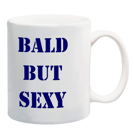 White ceramic mug printed with “Bald But Sexy” in navy stencil letters