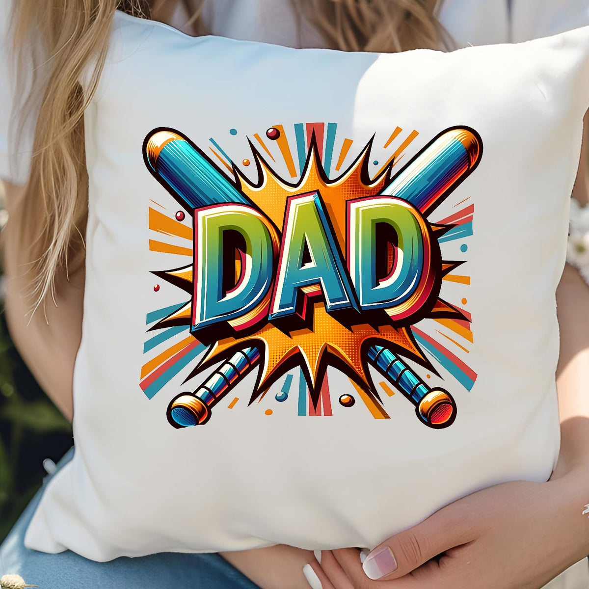 Hands holding the DAD baseball bats cushion