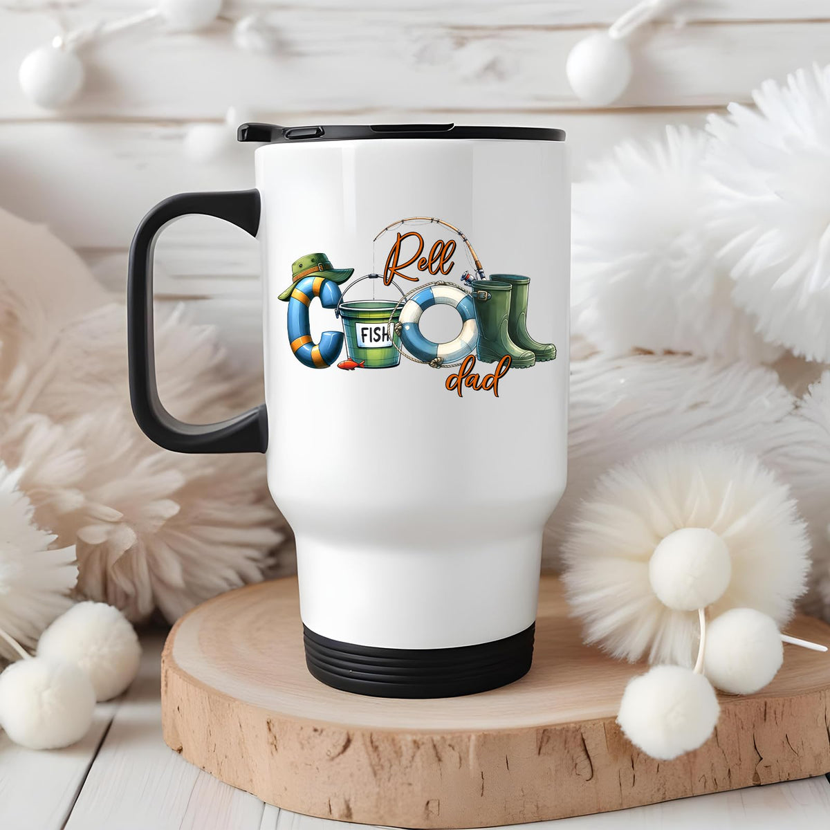 Reel Cool Dad travel mug on a wooden slice with white pom-poms