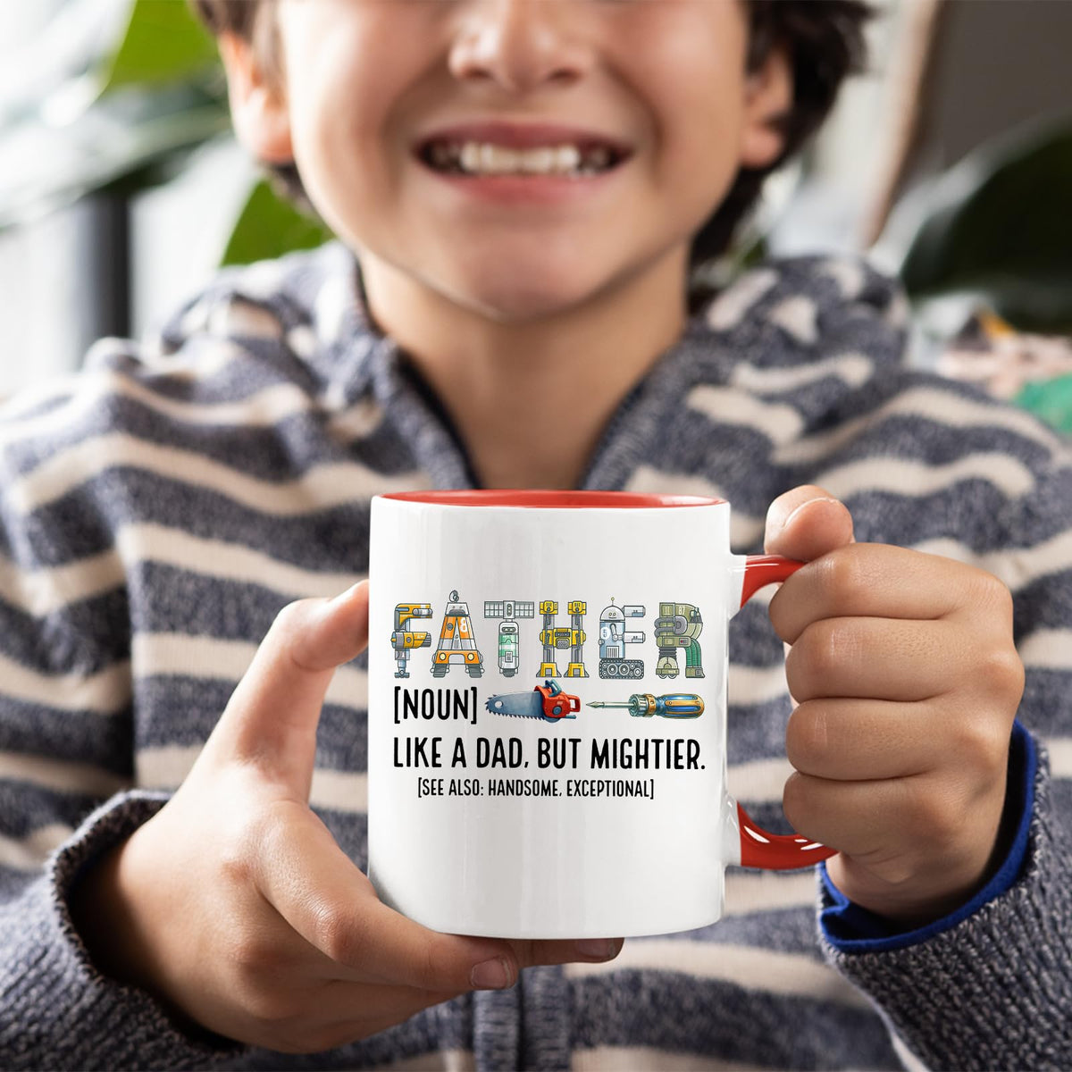 Smiling child holding the Father definition mug with a red handle