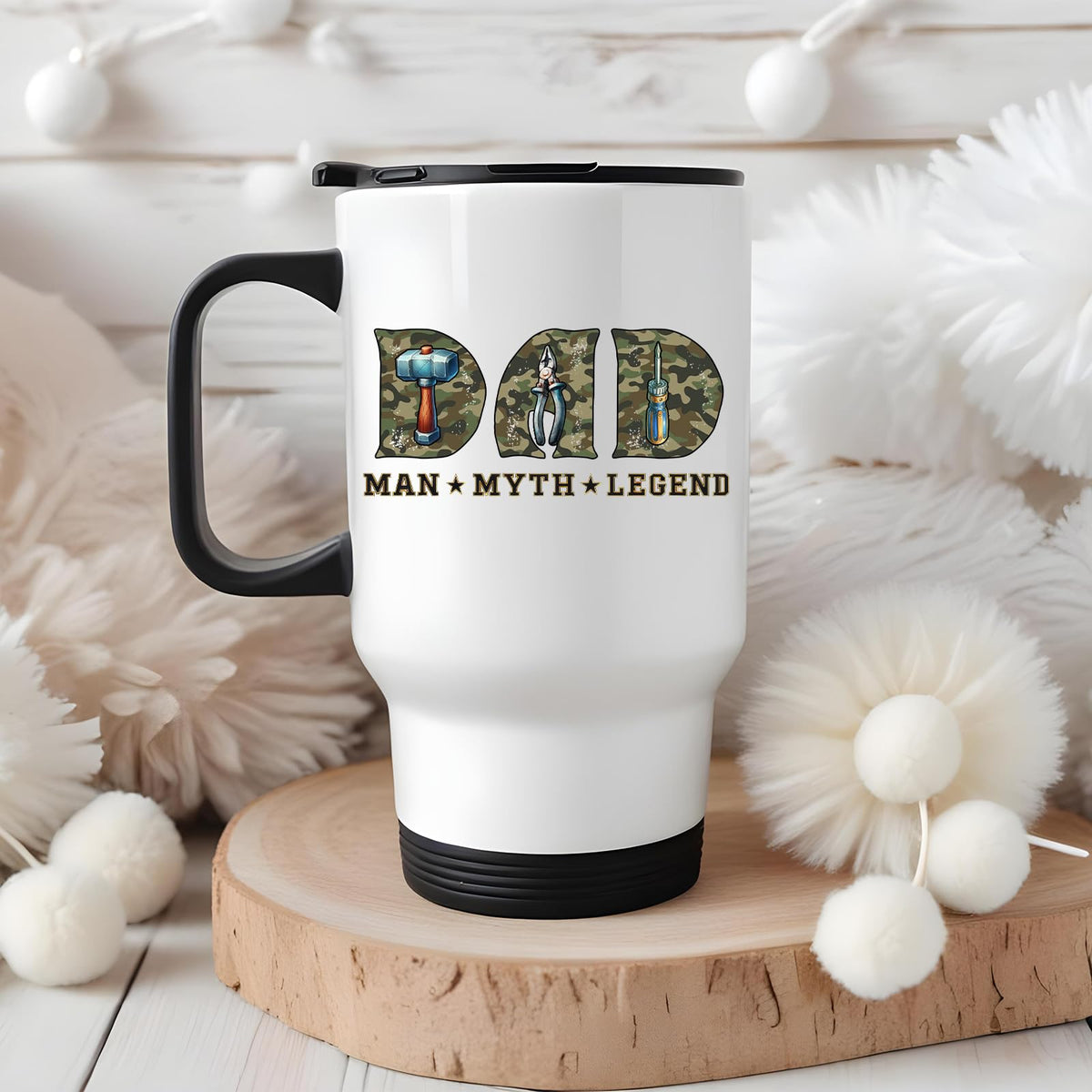 Dad Man Myth Legend tools travel mug on a wooden slice with white pom-poms