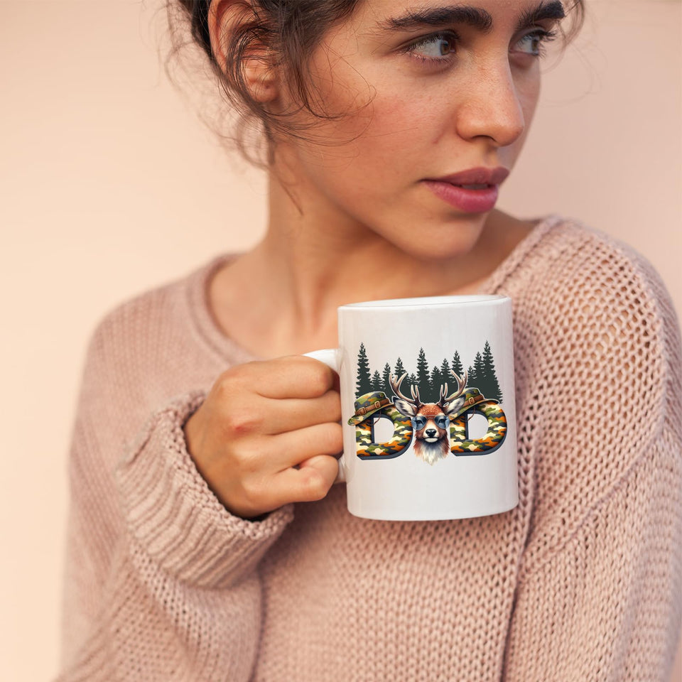 Woman in a pink jumper holding the Hunting Dad deer mug