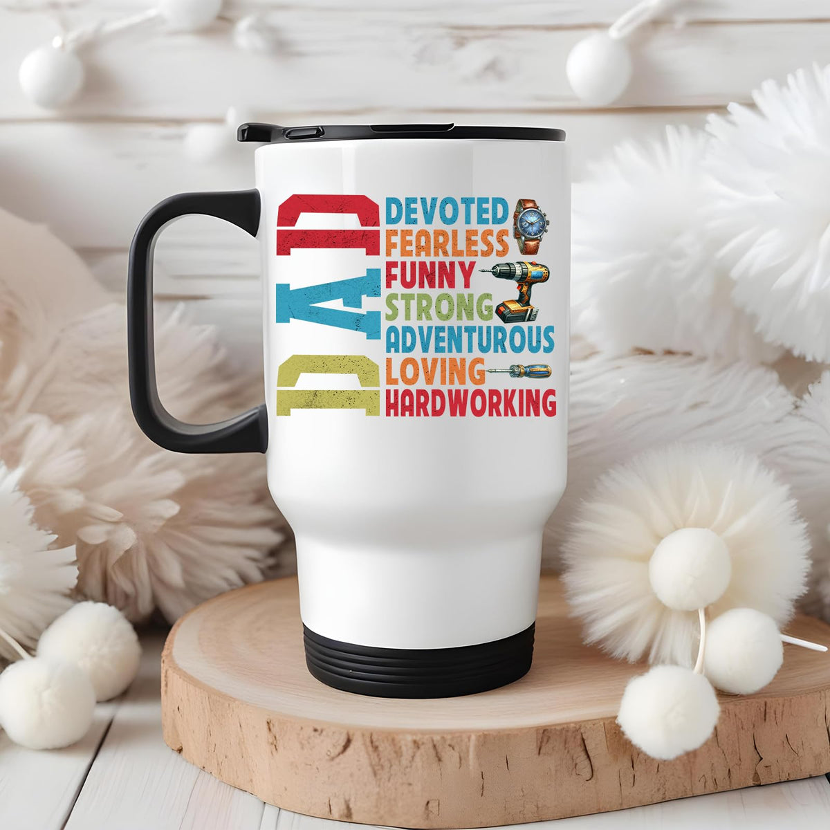 DAD Devoted travel mug on a wooden slice with white pom-poms