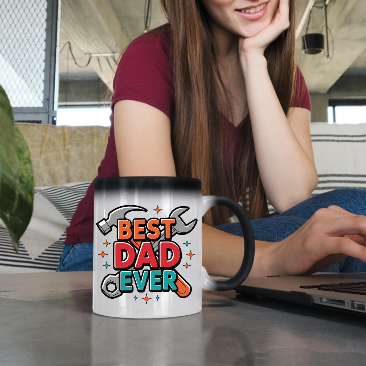Woman at a laptop with the Best Dad Ever tools colour changing mug