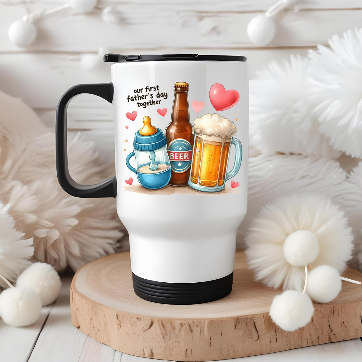 First Father’s Day hearts travel mug on a wooden slice with white pom-poms