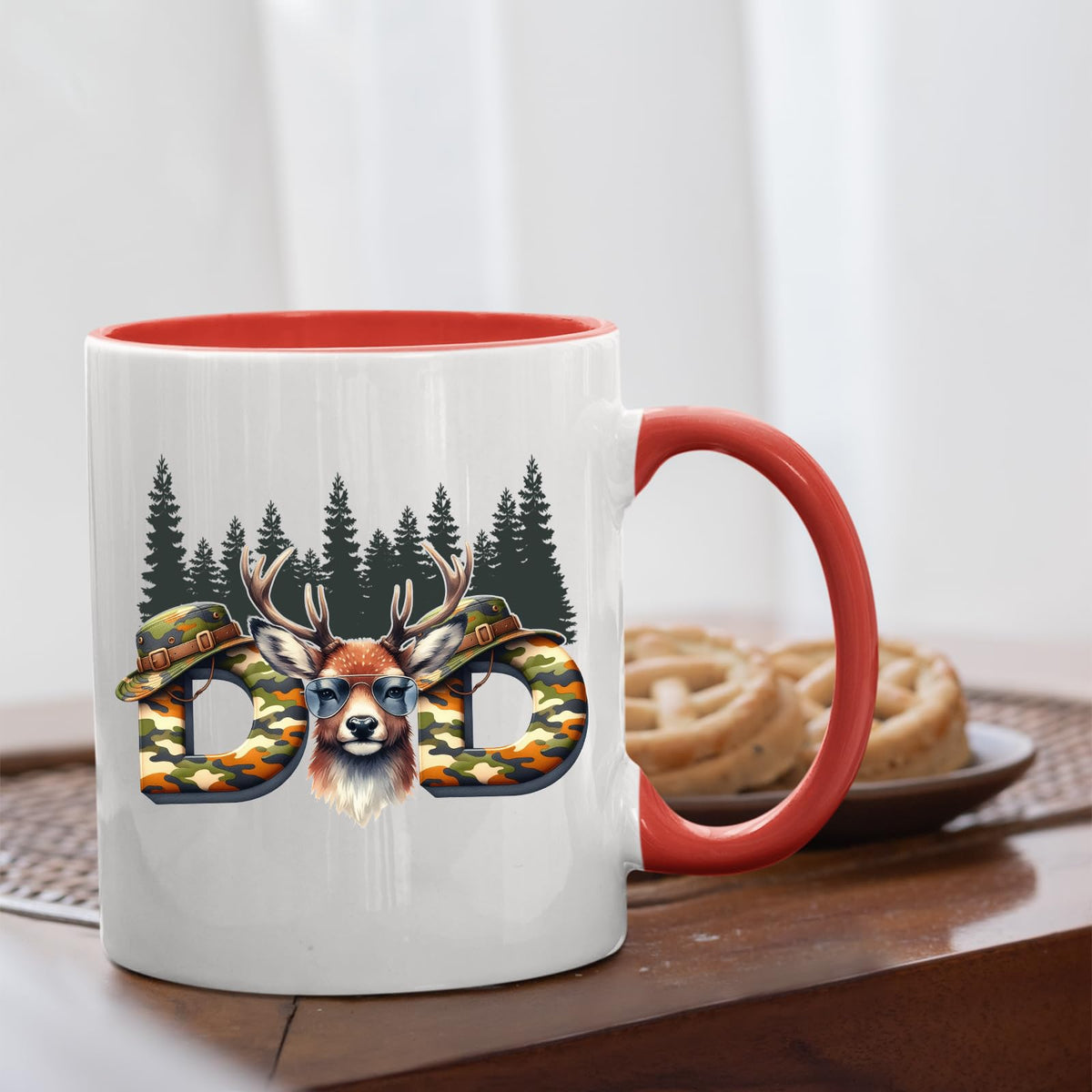 Hunting Dad deer mug with a red handle beside biscuits
