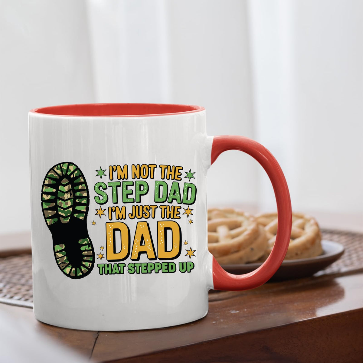 Dad That Stepped Up mug with a red handle beside biscuits