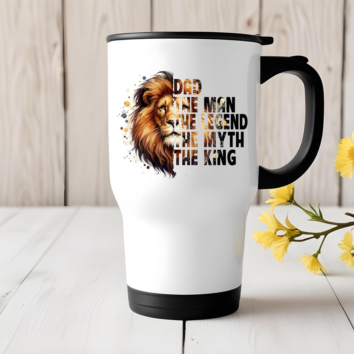 Dad the King lion travel mug on a white wooden table with yellow flowers