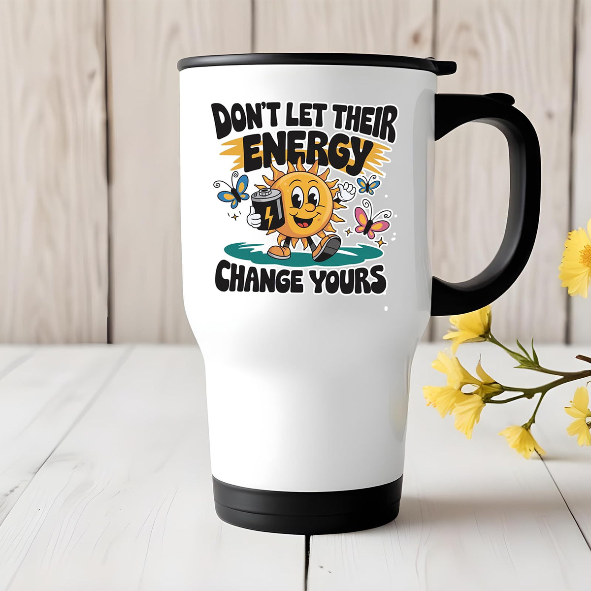 Positive Vibes sun travel mug on a white wooden table with yellow flowers