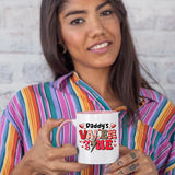 Woman in a striped shirt holding the Daddy’s Valentine colour handle mug