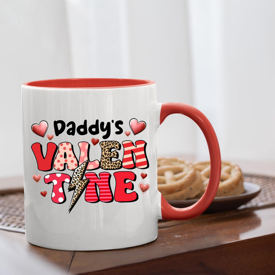 Daddy’s Valentine mug with a red handle beside biscuits