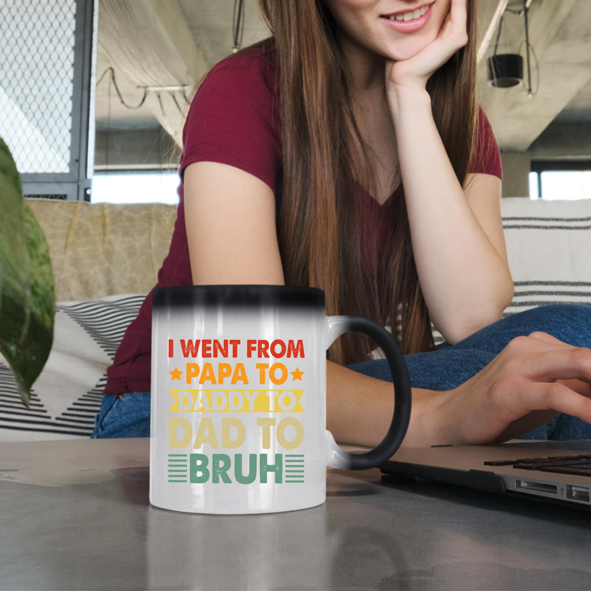 Woman at a laptop with the Papa to Bruh colour changing mug