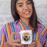 Woman in a striped shirt holding the Dad Bod bear colour handle mug