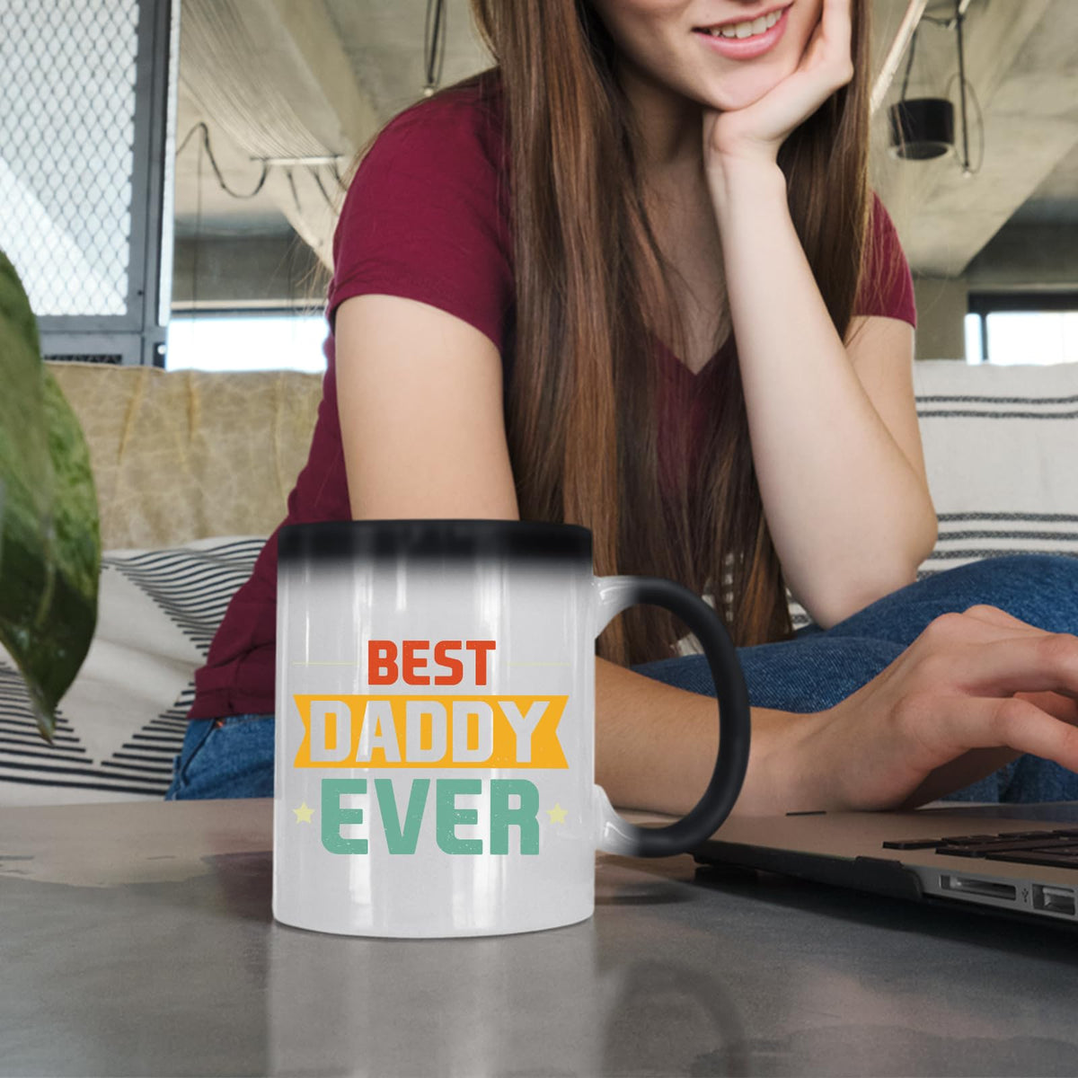 Woman at a laptop with the Best Daddy Ever retro colour changing mug