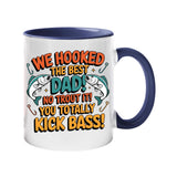 Colour handle mug with two leaping fish and “We hooked the best Dad! No trout about it! You totally kick bass!” – dark blue handle and inside