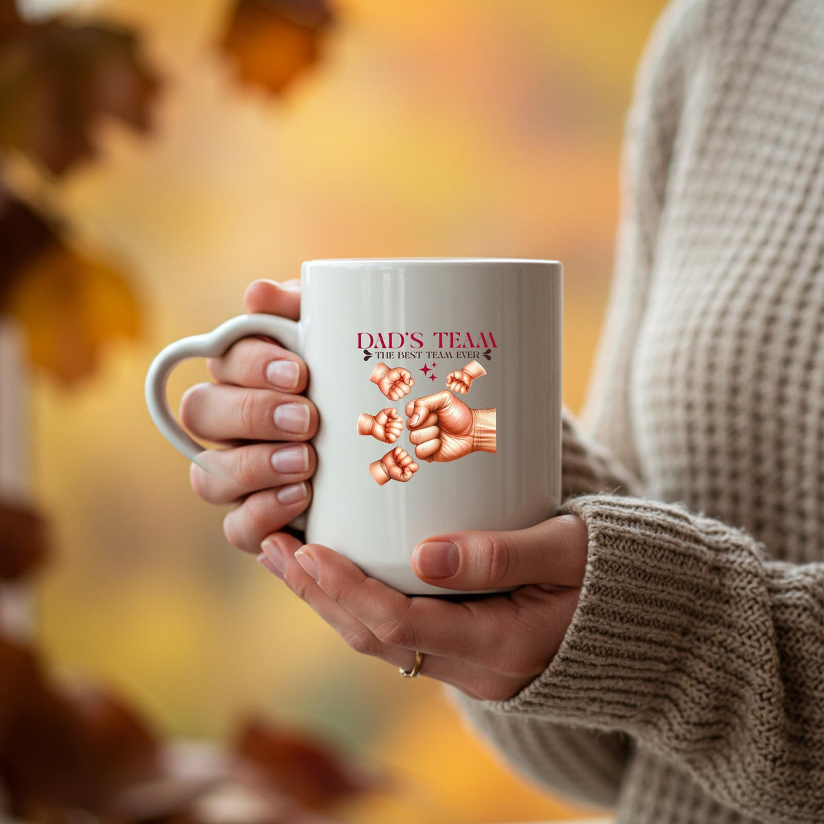 Hands holding the Dad’s Team fist bump heart-handle mug