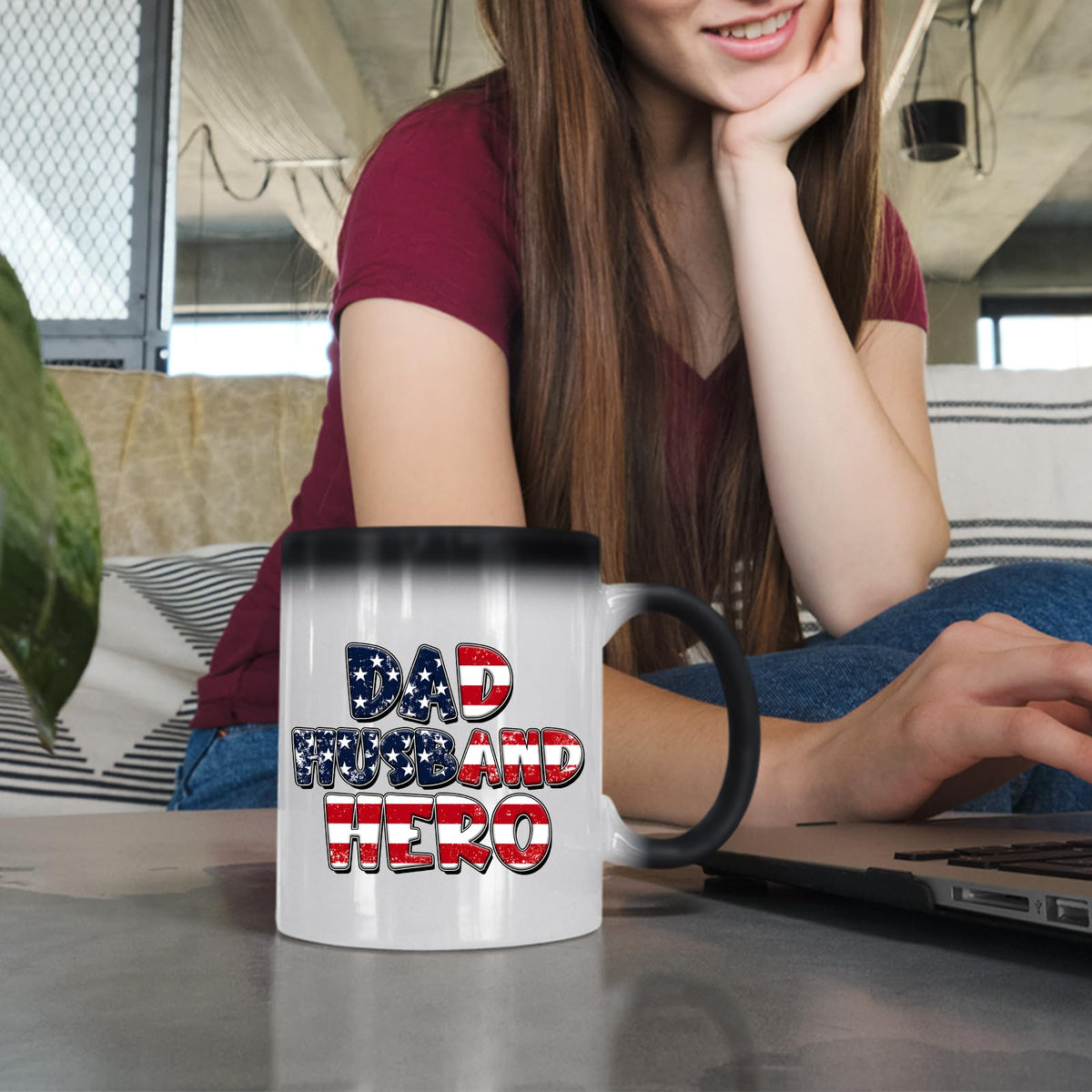 Woman at a laptop with the Dad Husband Hero colour changing mug