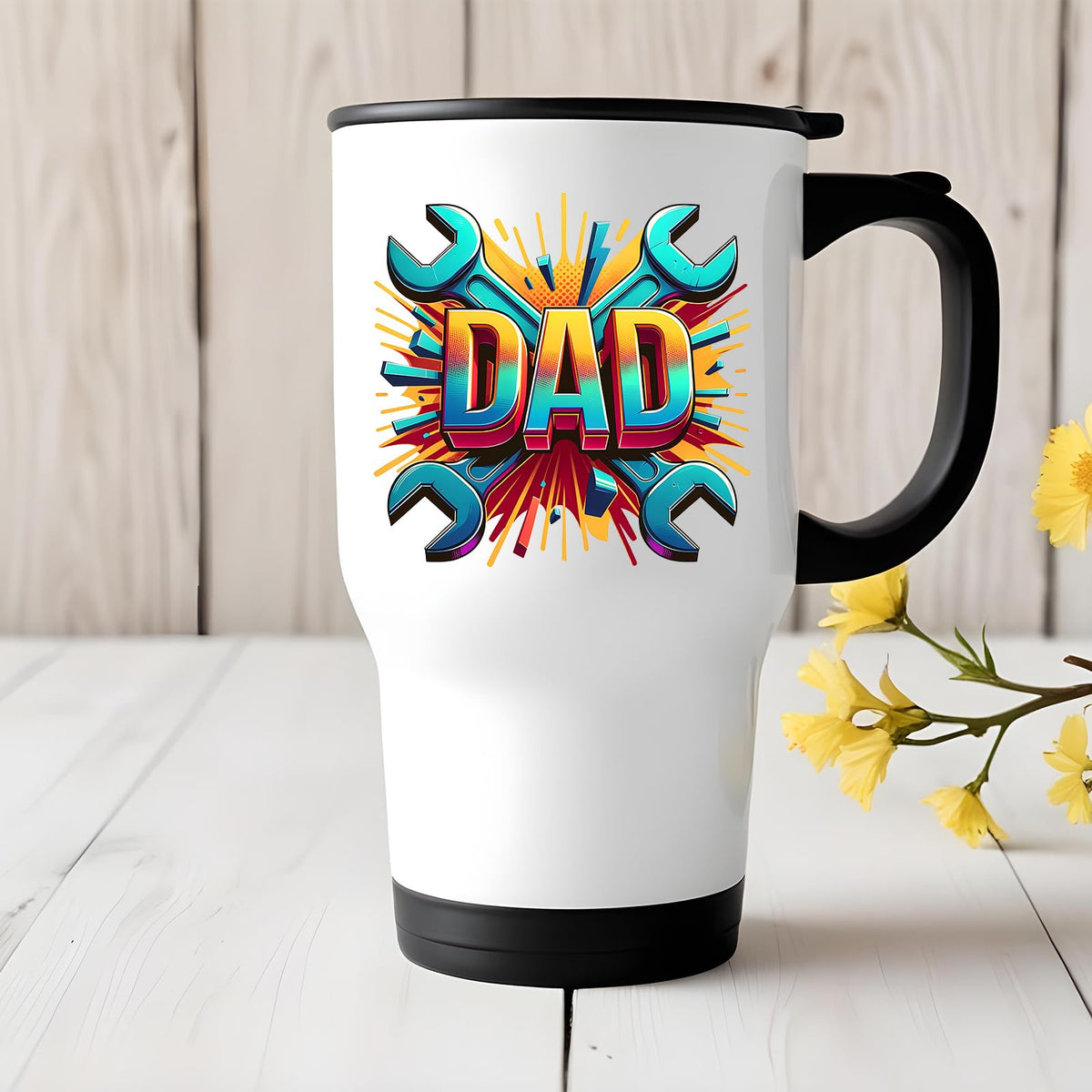 DAD spanners travel mug on a white wooden table with yellow flowers