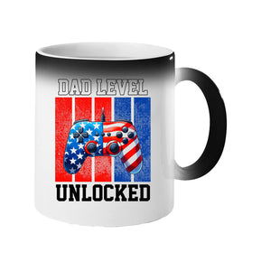 Colour changing mug revealing a stars-and-stripes game controller and “Dad level unlocked”