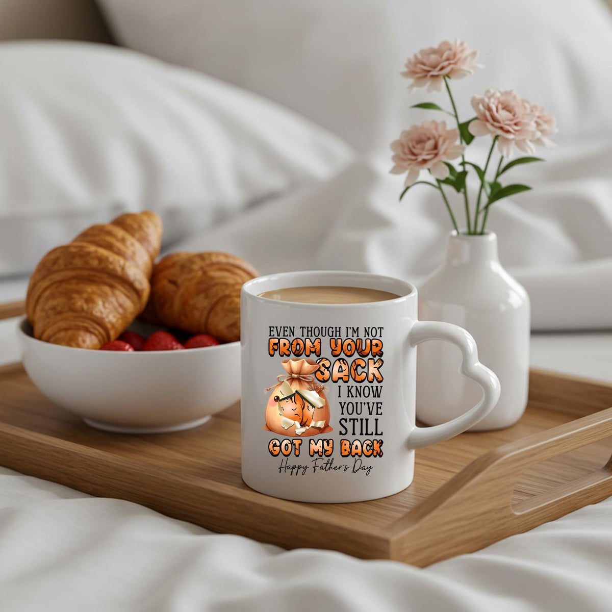 Not From Your Sack heart-handle mug on a breakfast tray with croissants and flowers