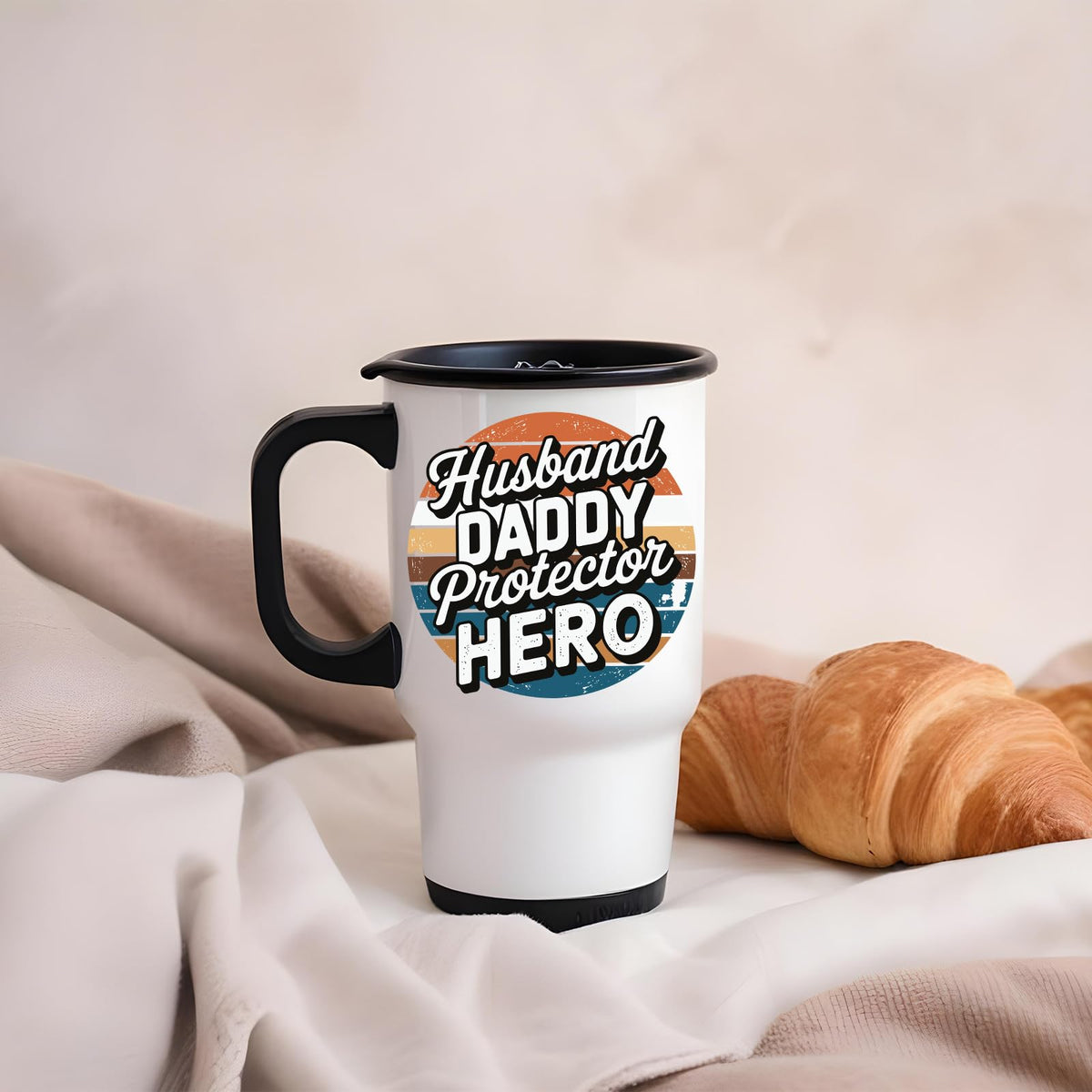 Husband Daddy Protector Hero retro travel mug on a soft blanket beside a croissant