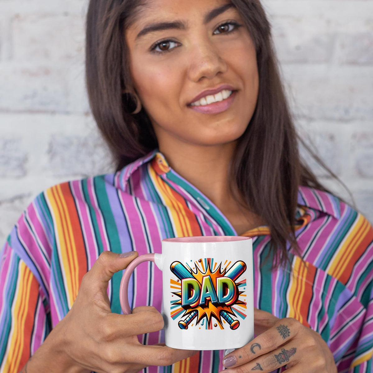 Woman in a striped shirt holding the DAD baseball bats colour handle mug