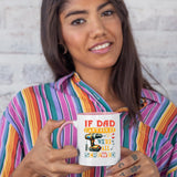 Woman in a striped shirt holding the If Dad Can’t Fix It colour handle mug