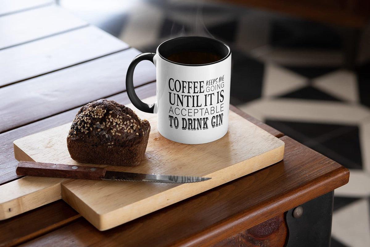Coffee until gin mug filled with coffee on a wooden board next to a muffin