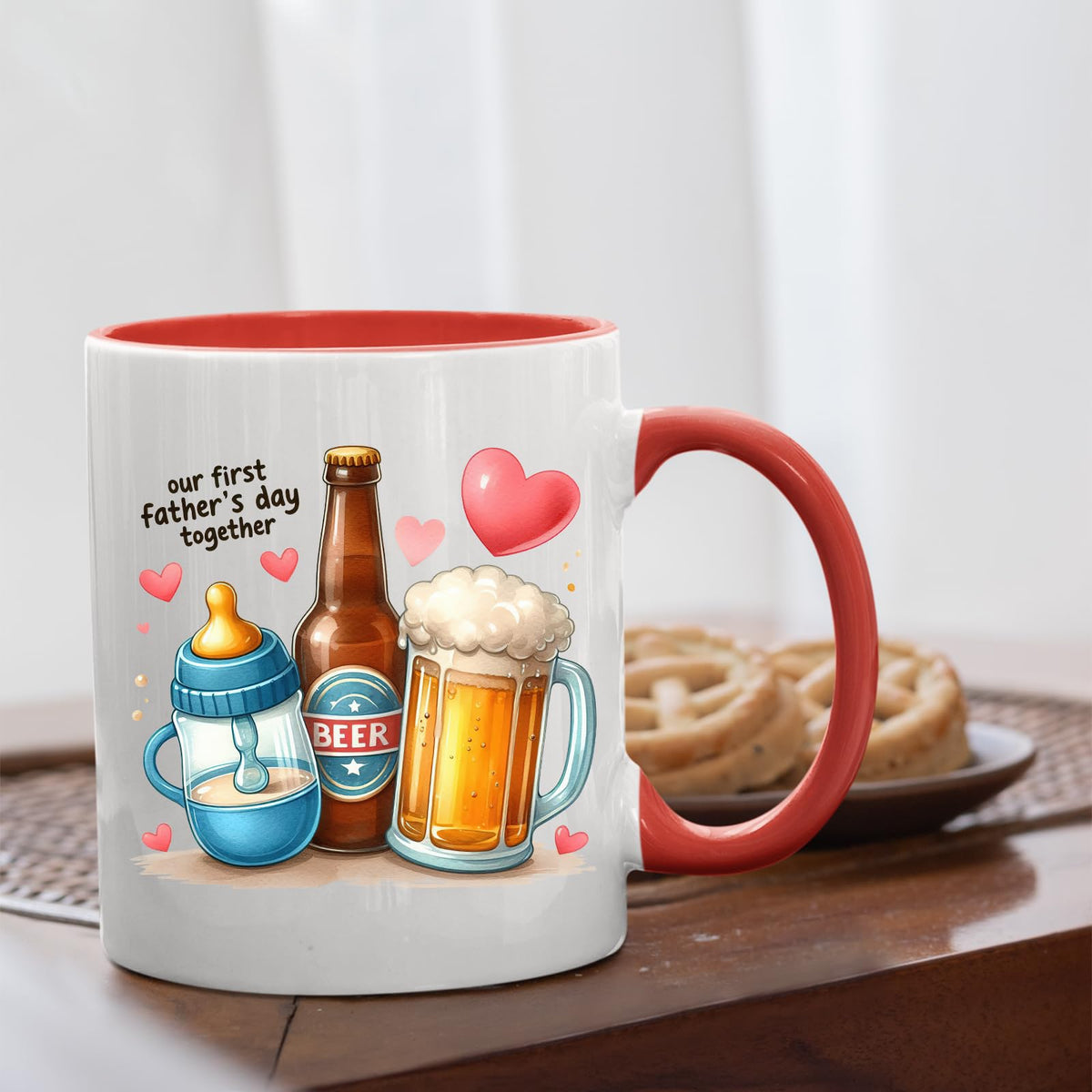 First Father’s Day hearts mug with a red handle beside biscuits
