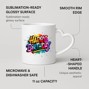 Happy Birthday rainbow splash heart-handle mug on a marble counter with fruit