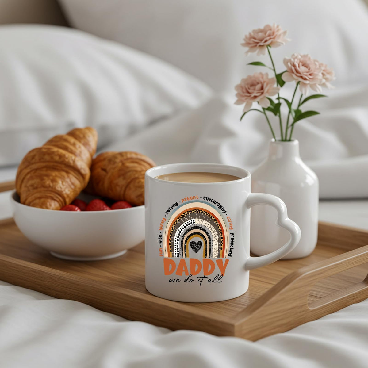 Daddy boho rainbow heart-handle mug on a breakfast tray with croissants and flowers
