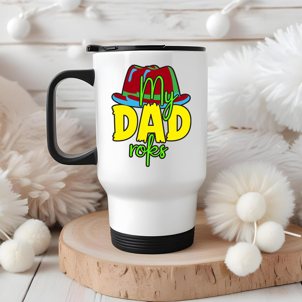 Travel mug with the My Dad Rocks design in a cosy winter setting