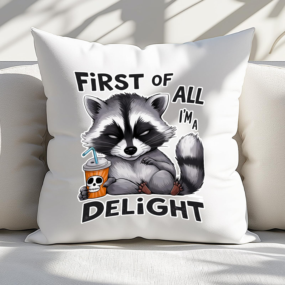 First of All I’m a Delight raccoon cushion on a white sofa